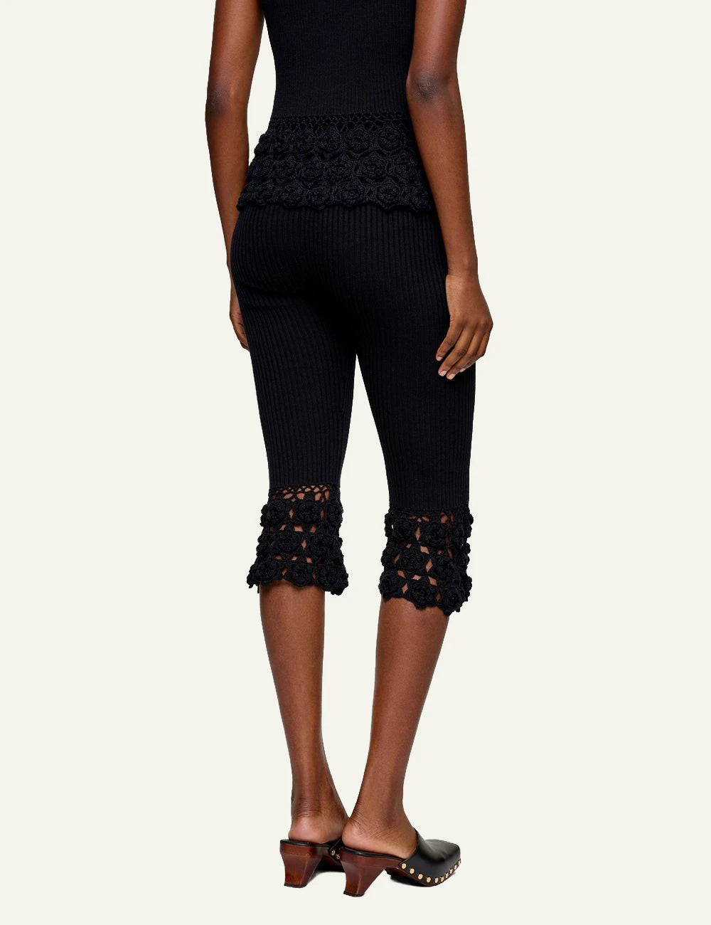 Ganni rib crochet pants black flared knit hem detail back view