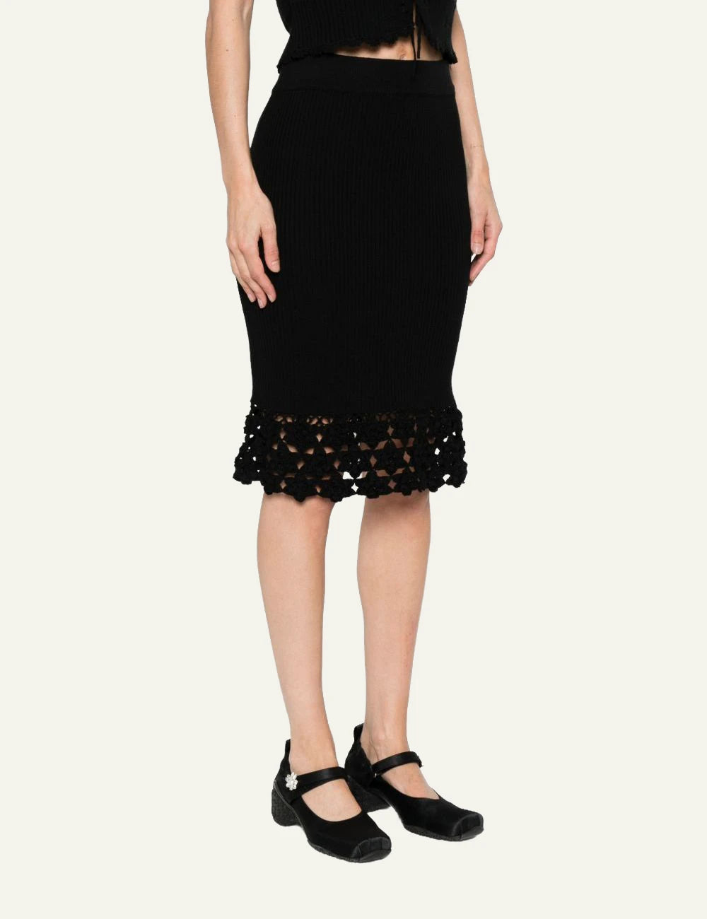 Ganni rib crochet skirt black midi knit hem detail side model view