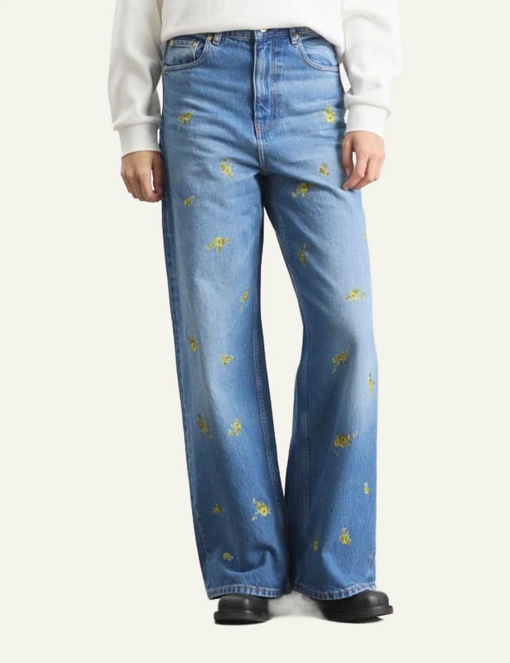 Ganni floral embroidered wide leg jeans blue front model view