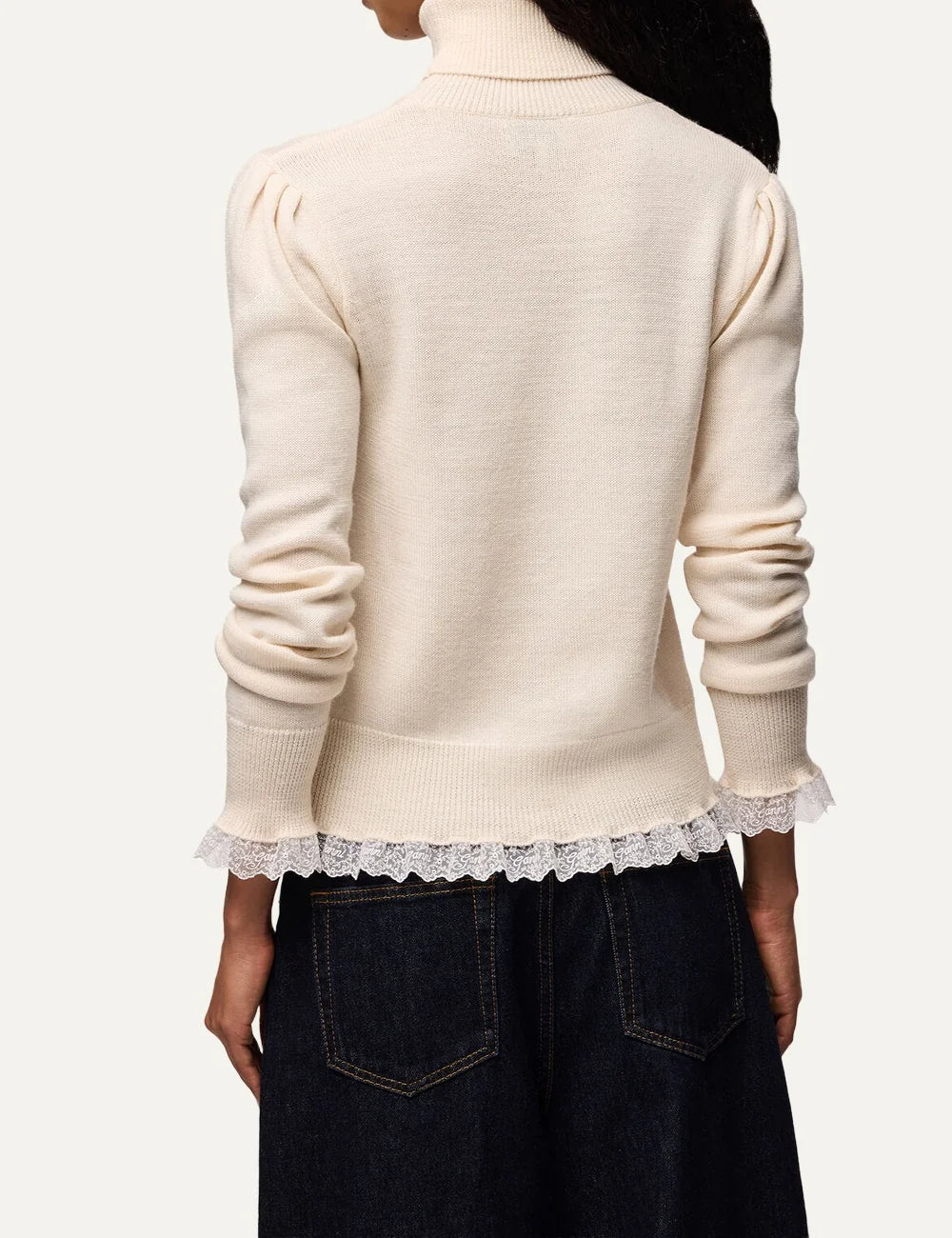 Ganni women's turtleneck sweater with long sleeves, ribbed edges, lace trim and subtle chest logo back