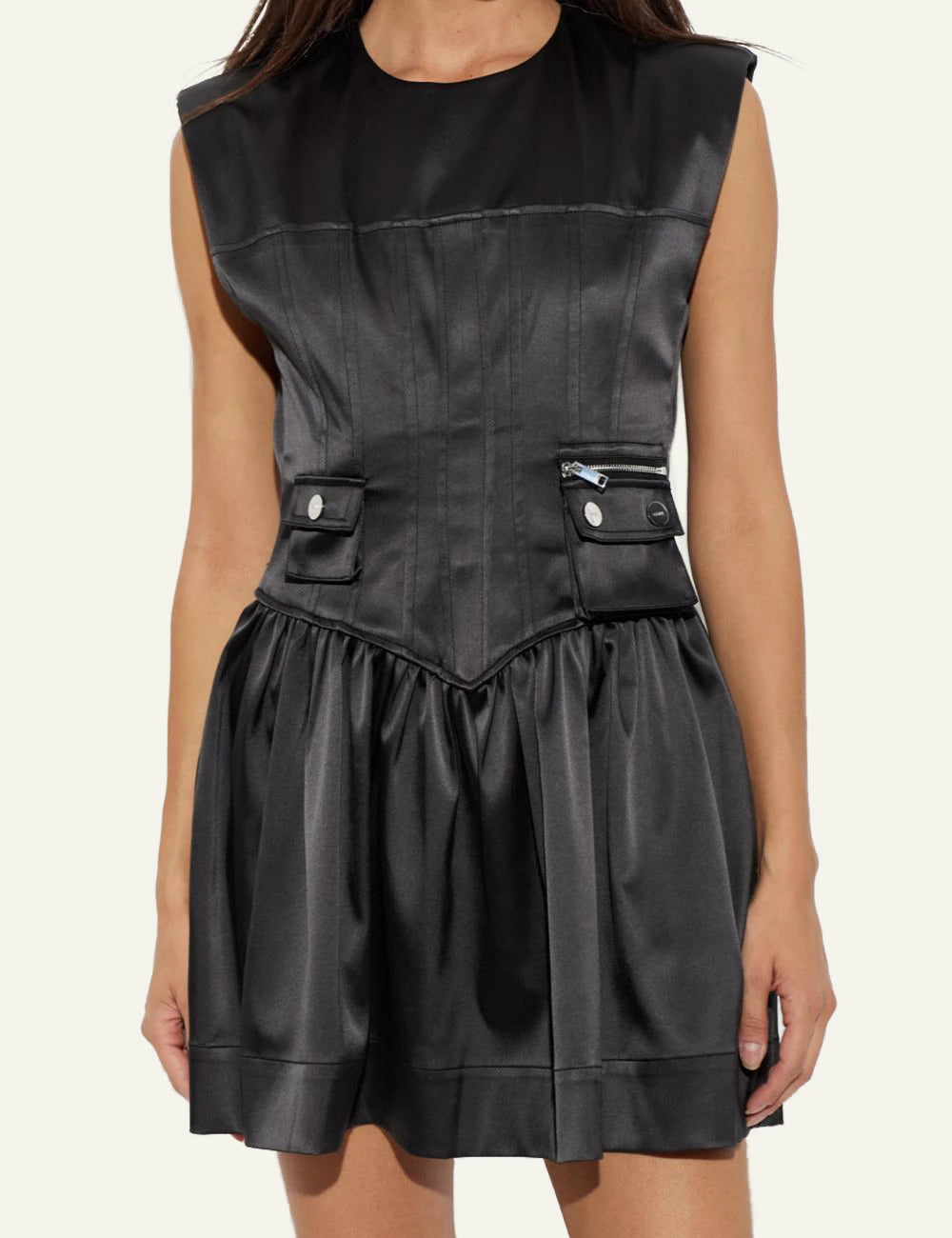 Women's Ganni black sleeveless fitted mini dress with corset waist and decorative pockets model