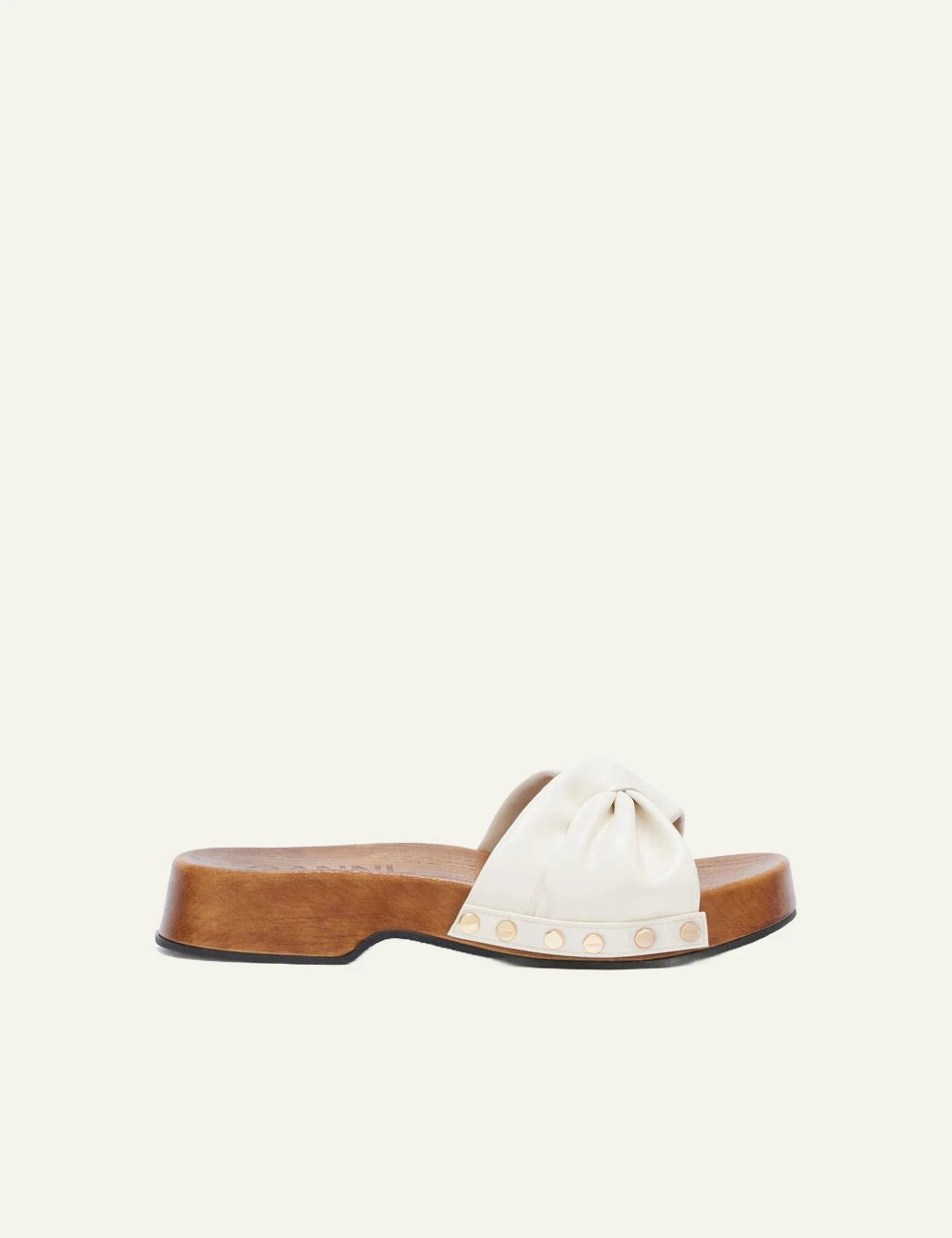 Ganni wooden clogs off white leather strap with stud details side view