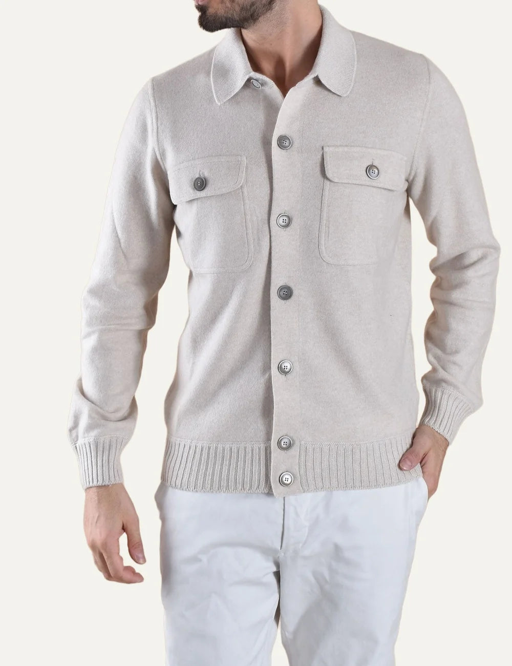 Men's Gran Sasso beige cashmere knit cardigan with button fastening, classic collar and two buttoned chest flap pockets. front view