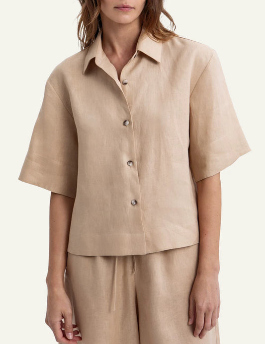 Greek Archaic Kori beige short sleeve shirt front view