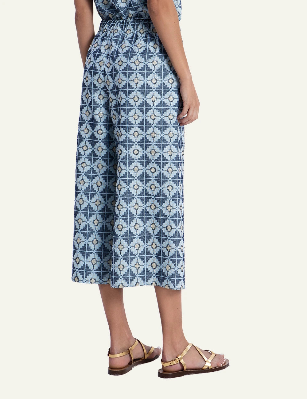 Greek Archaic Kori daisy blue patterned wide leg pants back view