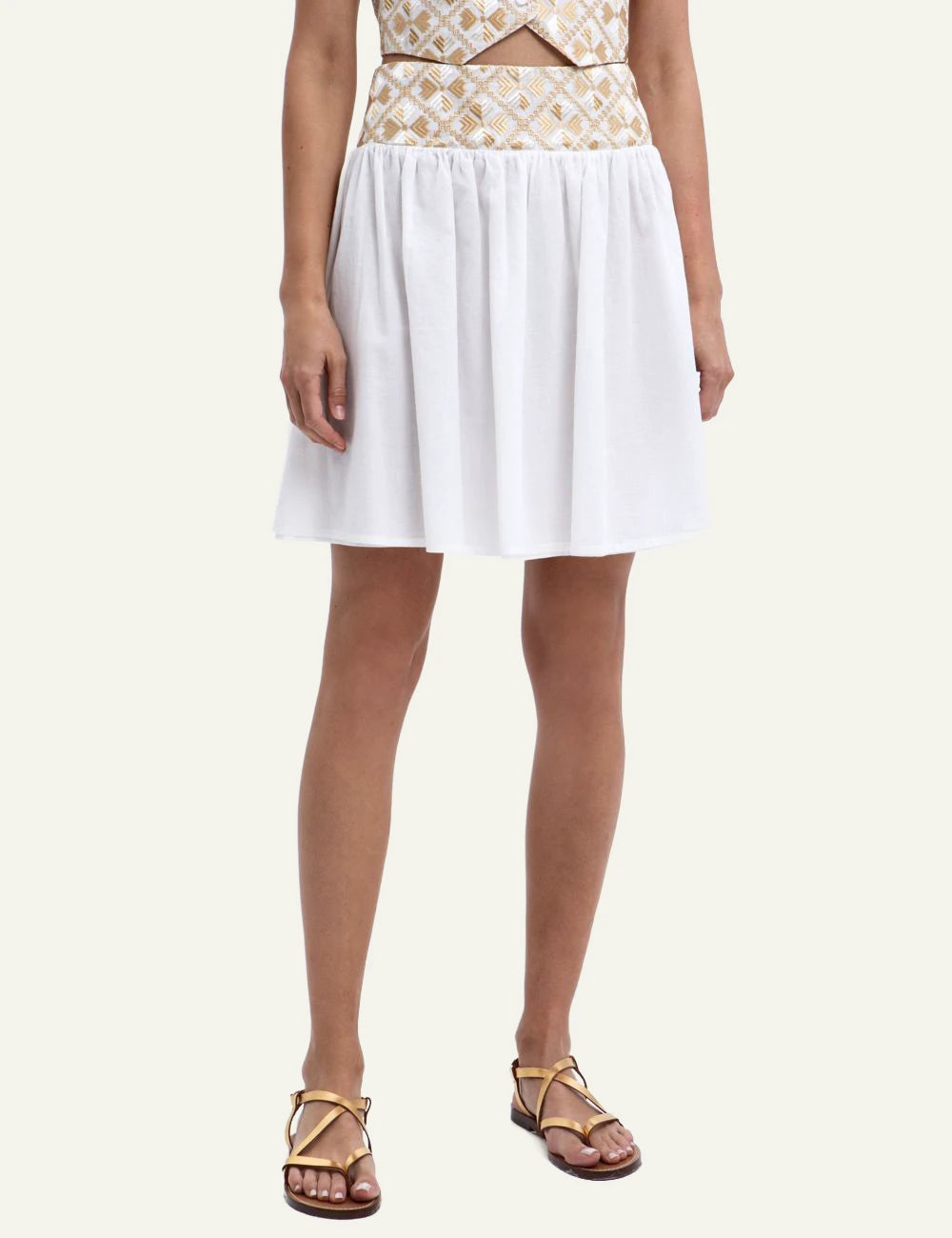 Greek Archaic Kori flakes white mini skirt front view