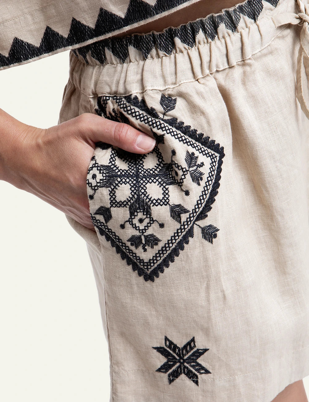 Greek Archaic Kori Lefkada embroidered linen shorts detail pocket view