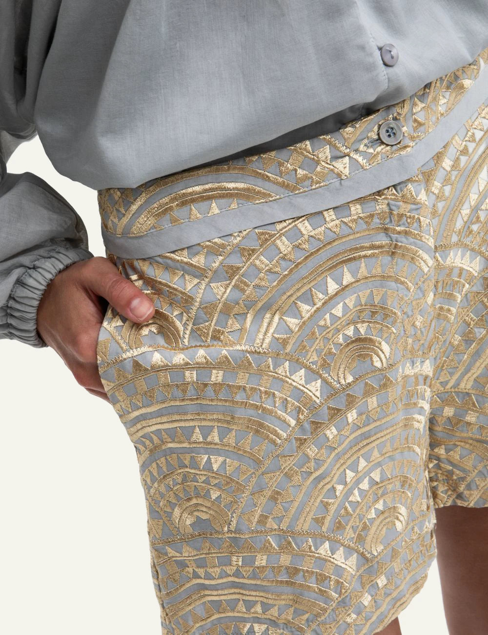 Greek Archaic Kori triangle shorts grey gold embroidered front detail