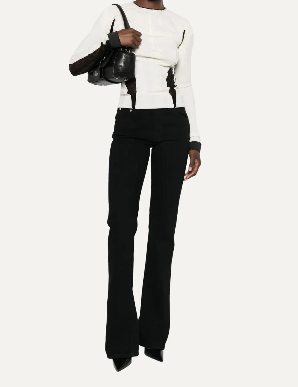 Haikure women Chewy black flared jeans with five-pocket design, back vertical seams and hem slits front view