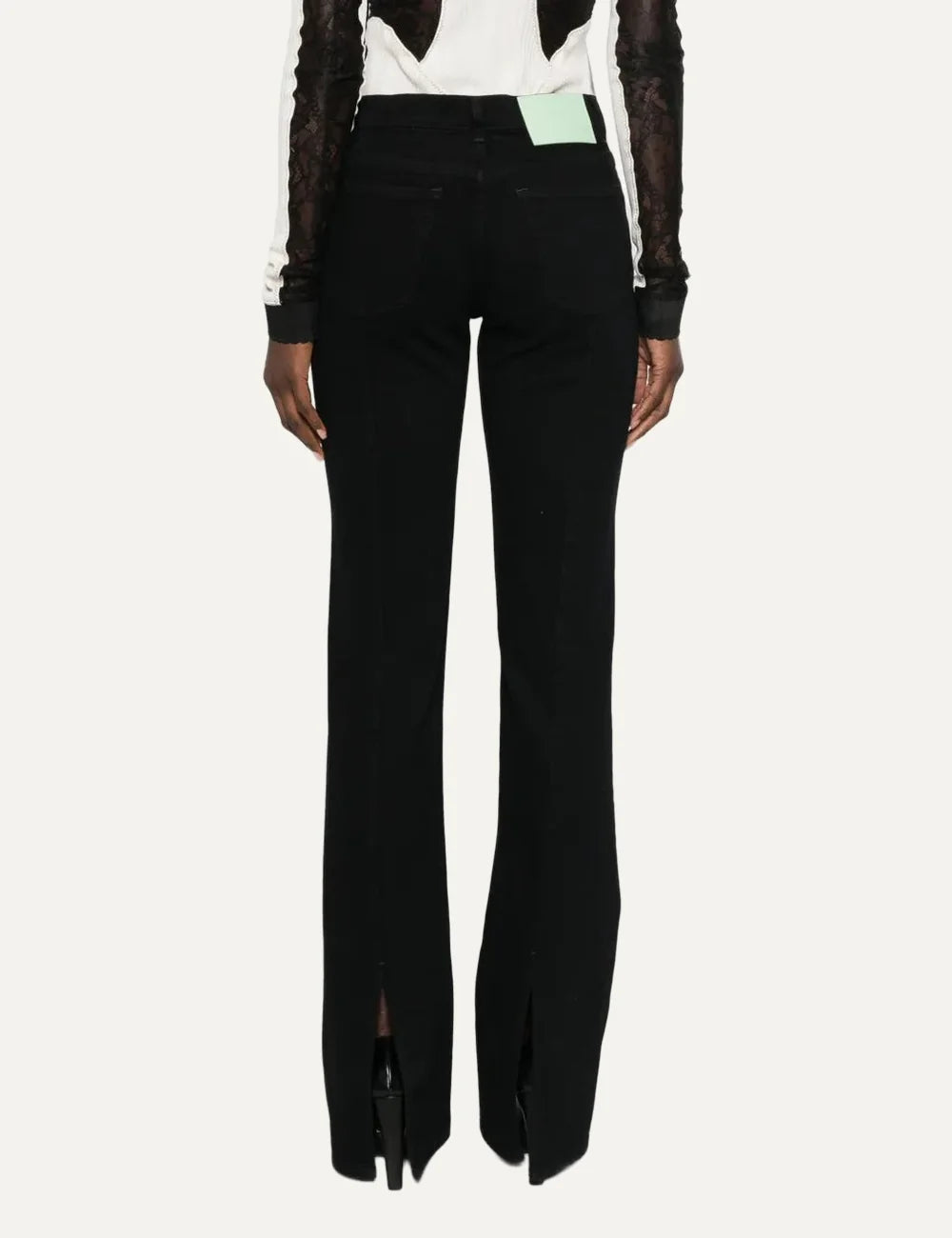 Haikure women Chewy black flared jeans with five-pocket design, back vertical seams and hem slits back view