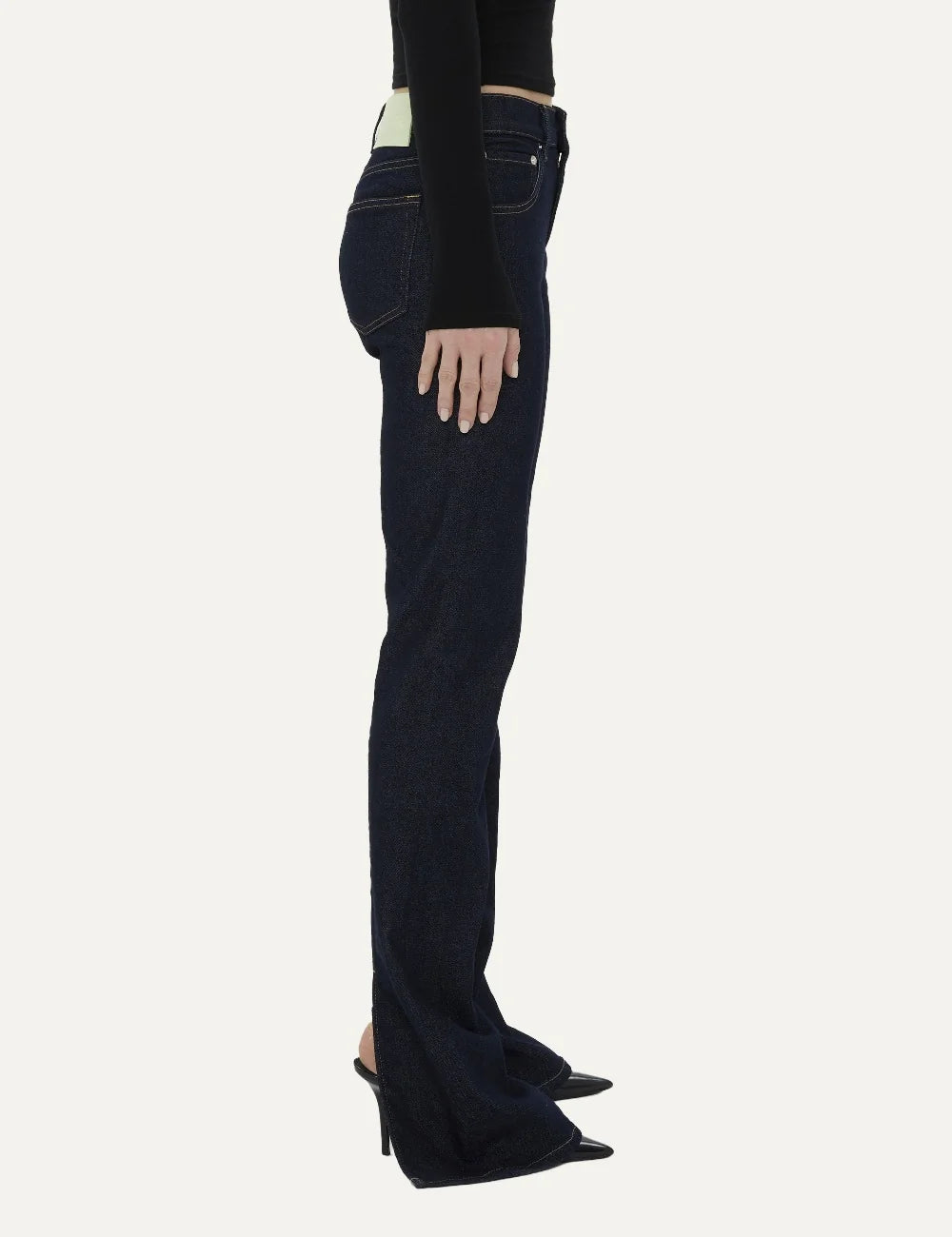 Haikure women Chewy Normal Wash dark blue flared jeans with five-pocket design and back hem slits side view