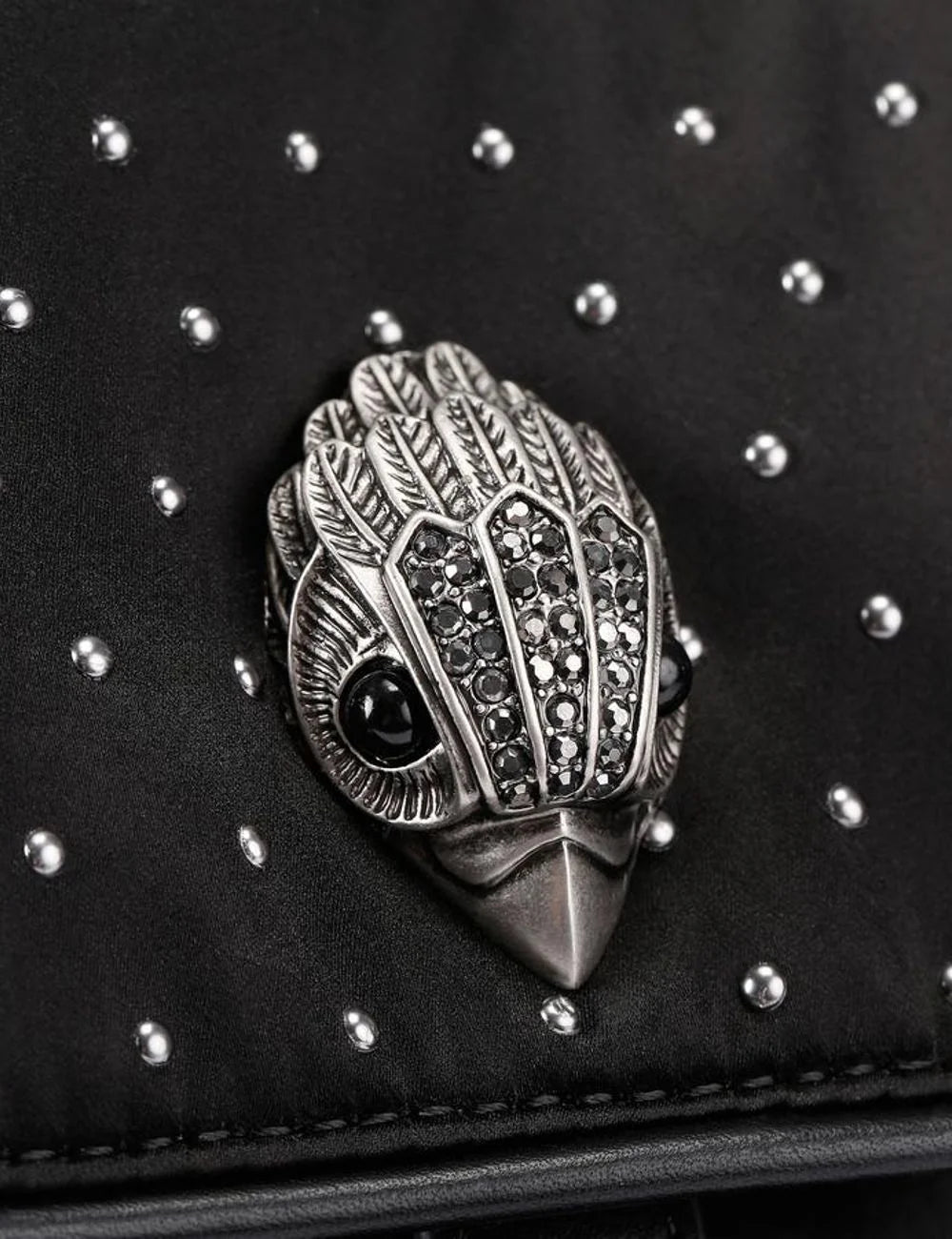 Kurt Geiger backpack eagle head logo silver studs close-up