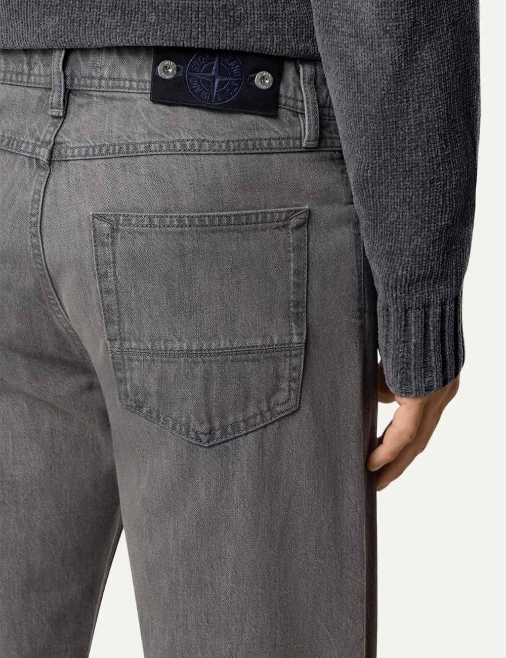 Stone Island men's light grey washed denim jeans with regular straight fit, five-pocket design and faded finish back