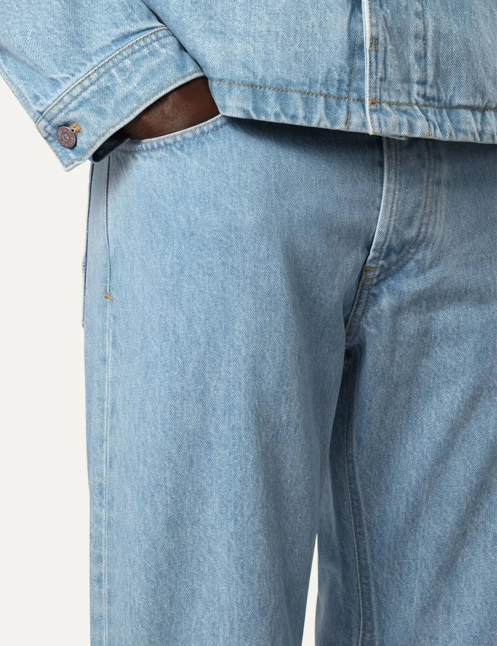 Stone Island men's light blue regular straight fit jeans with grainy stone-washed finish and classic five-pocket design detail