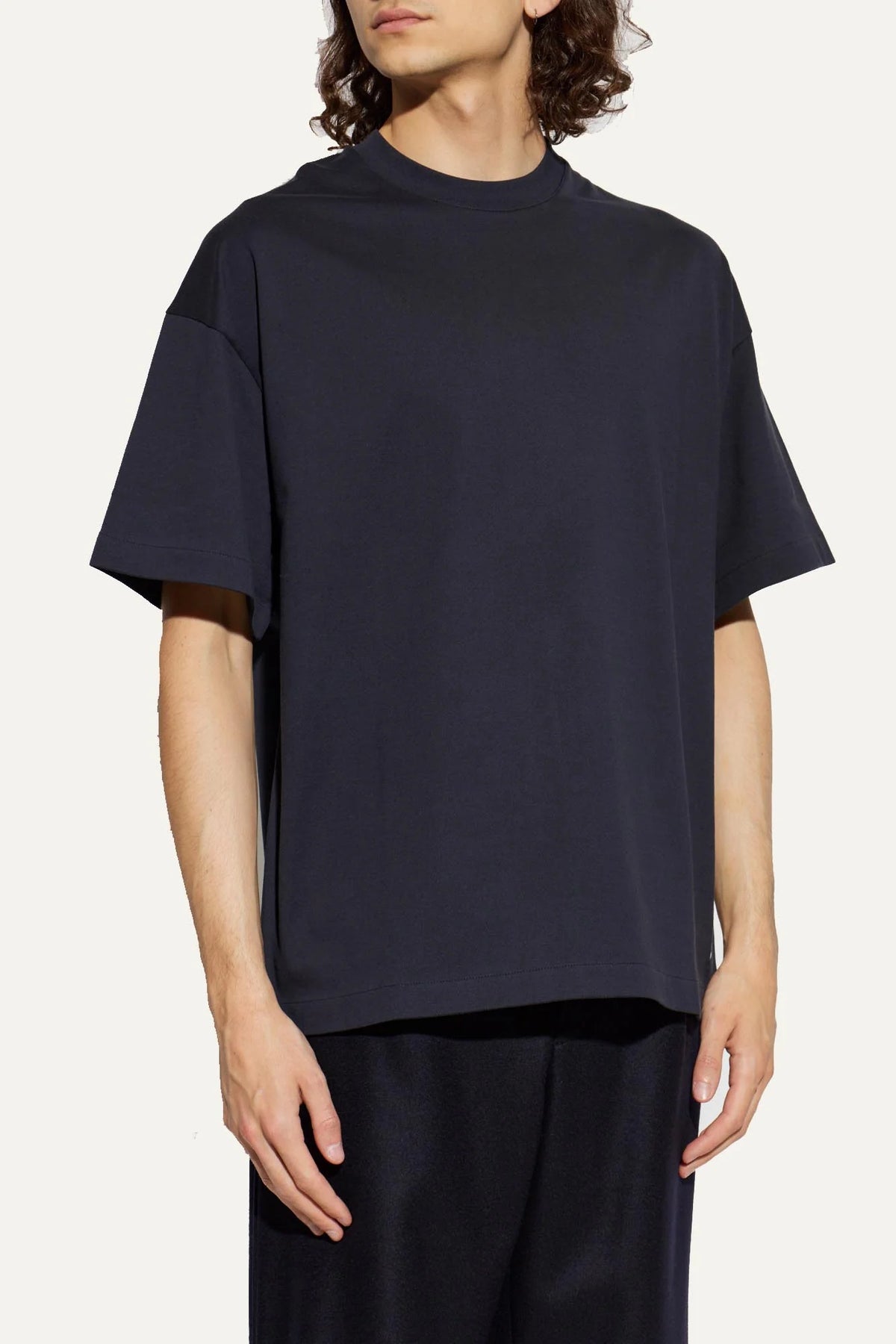 ALT TEXT: Jil Sander Men’s Navy Cotton Logo T-Shirt model