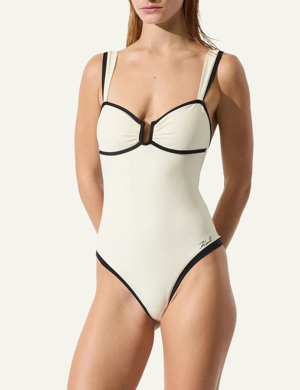 Karl Lagerfeld signature cheeky swimsuit cream black piping high cut front model