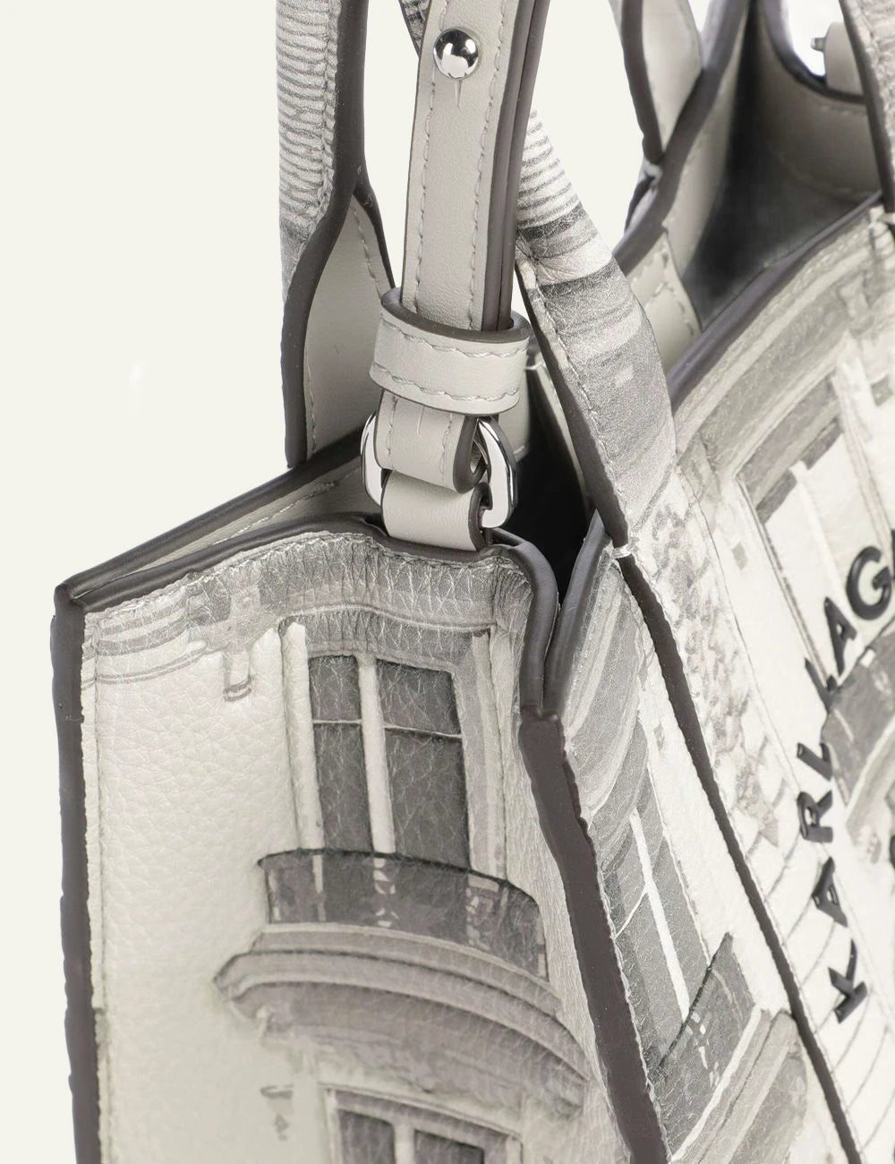 Karl Lagerfeld mini tote bag in ecru with Rue St-Guillaume building print and shoulder strap side