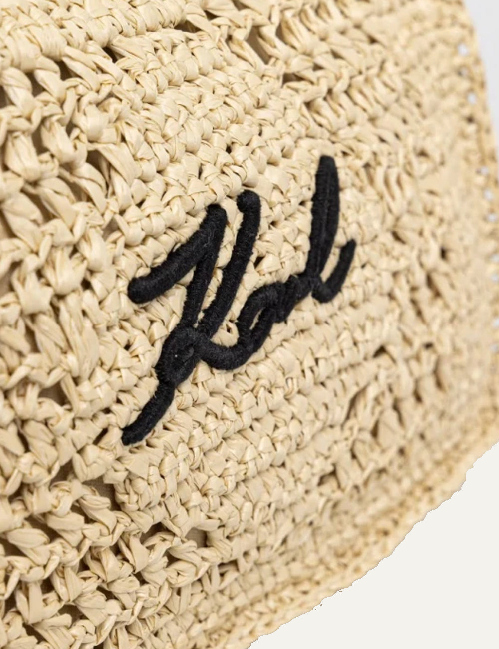 Karl Lagerfeld pouch beige woven clutch Karl logo wrist strap front detail view