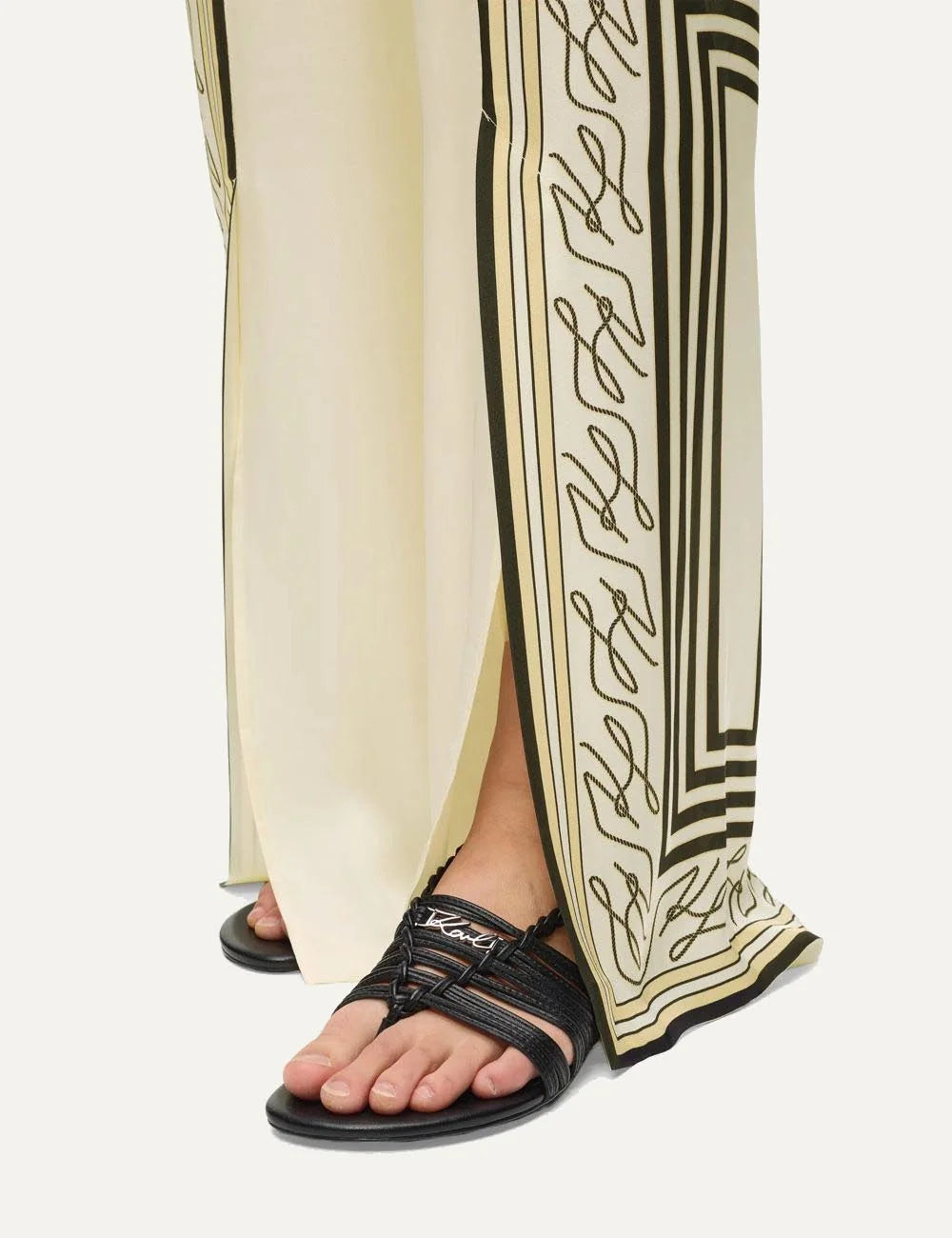 Karl Lagerfeld wide leg pants autograph print beige elastic waist split hem side detail view