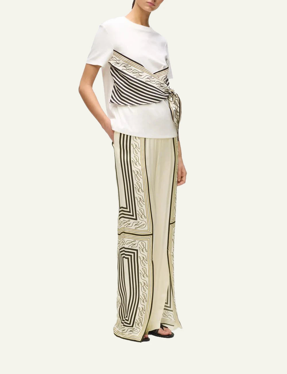Karl Lagerfeld wide leg pants autograph print beige elastic waist split hem front side view