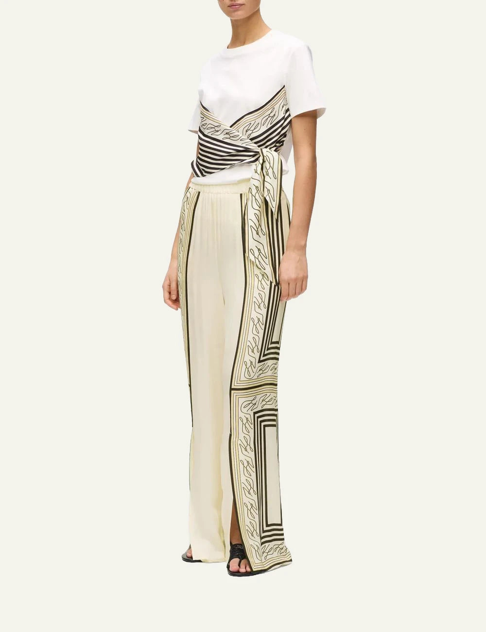 Karl Lagerfeld wide leg pants autograph print beige elastic waist split hem front full body view