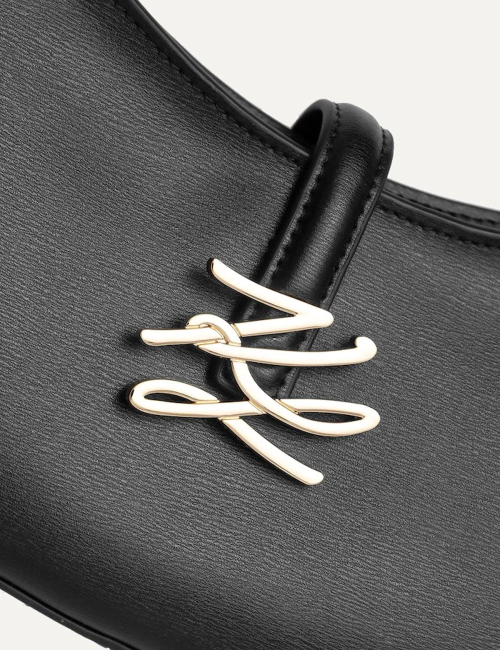 Karl Lagerfeld women's black leather K/Autograph shoulder bag with curved silhouette, adjustable strap and gold-tone signature logo detail
