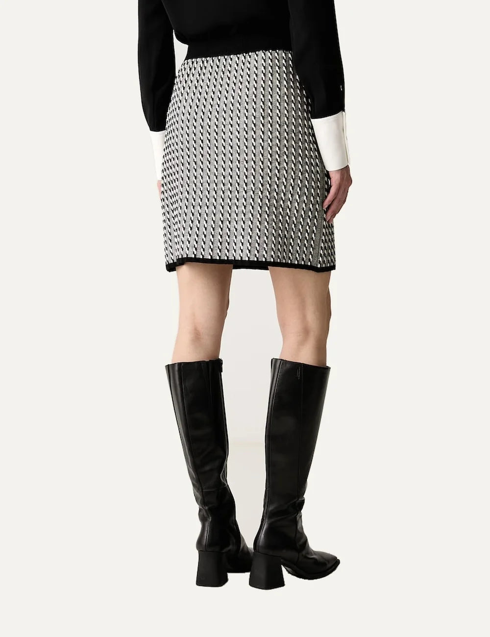 Karl Lagerfeld women's black and white knitted mini skirt with geometric pattern, straight fit and black faux leather trim back