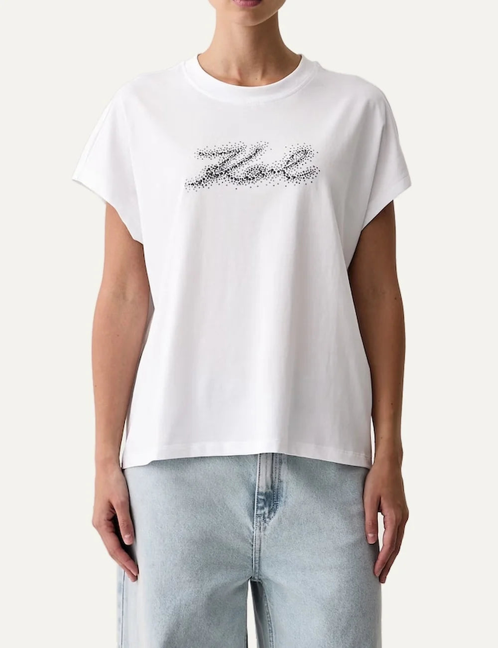 Karl Lagerfeld women's white cotton T-shirt with relaxed fit, round neckline, short sleeves and sparkling black Karl logo on the front.