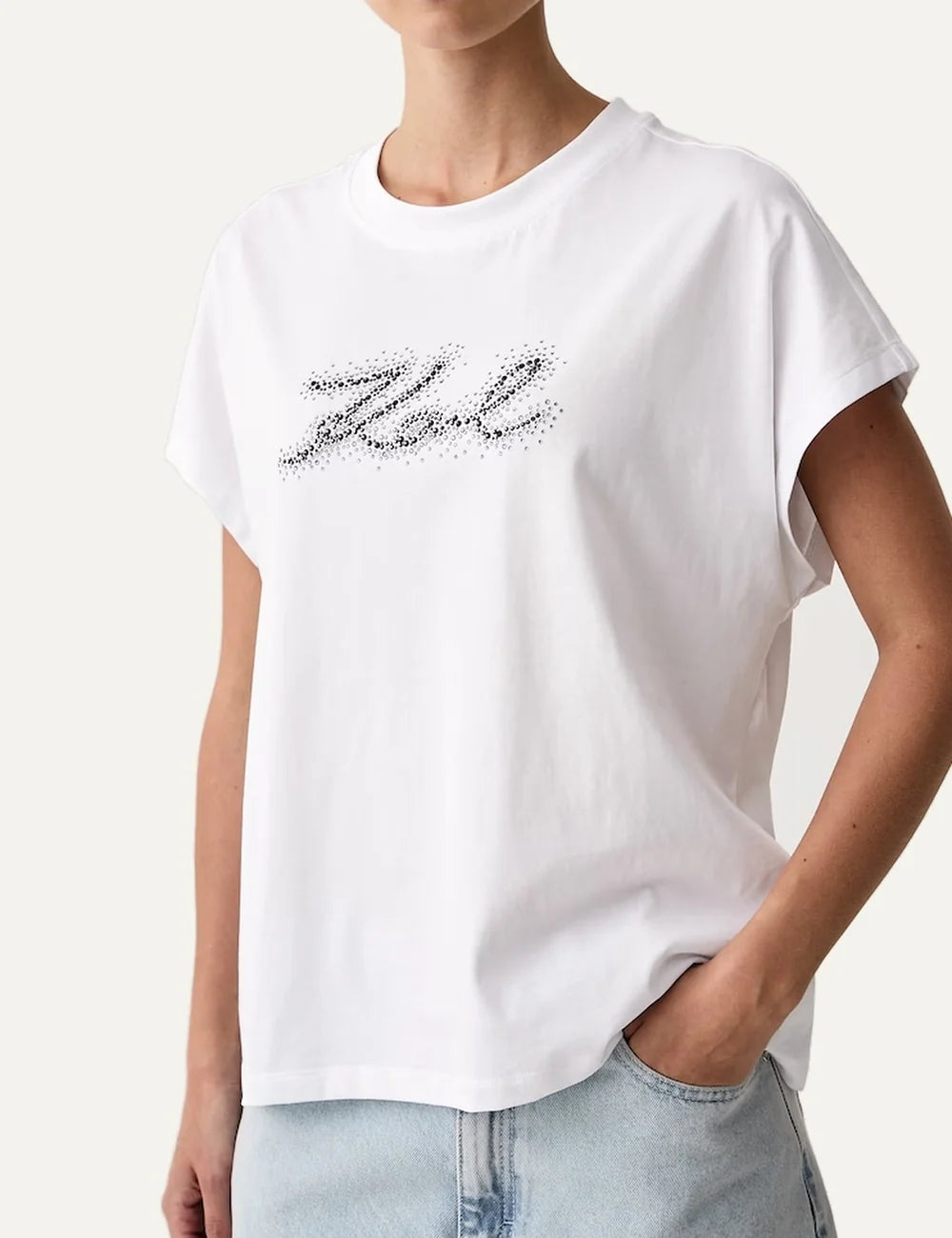 Karl Lagerfeld women's white cotton T-shirt with relaxed fit, round neckline, short sleeves and sparkling black Karl logo on the frontc side
