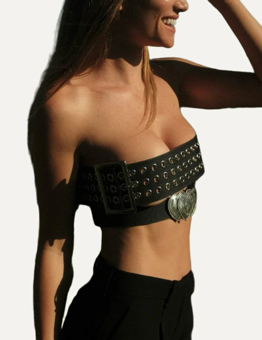Kate Cate women black nappa leather belt with silver-tone engraved western heart buckle on model