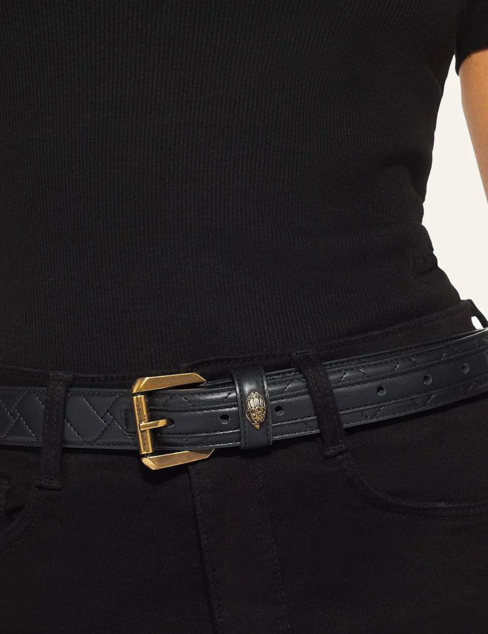 Kurt Geiger black belt worn with black pants detail