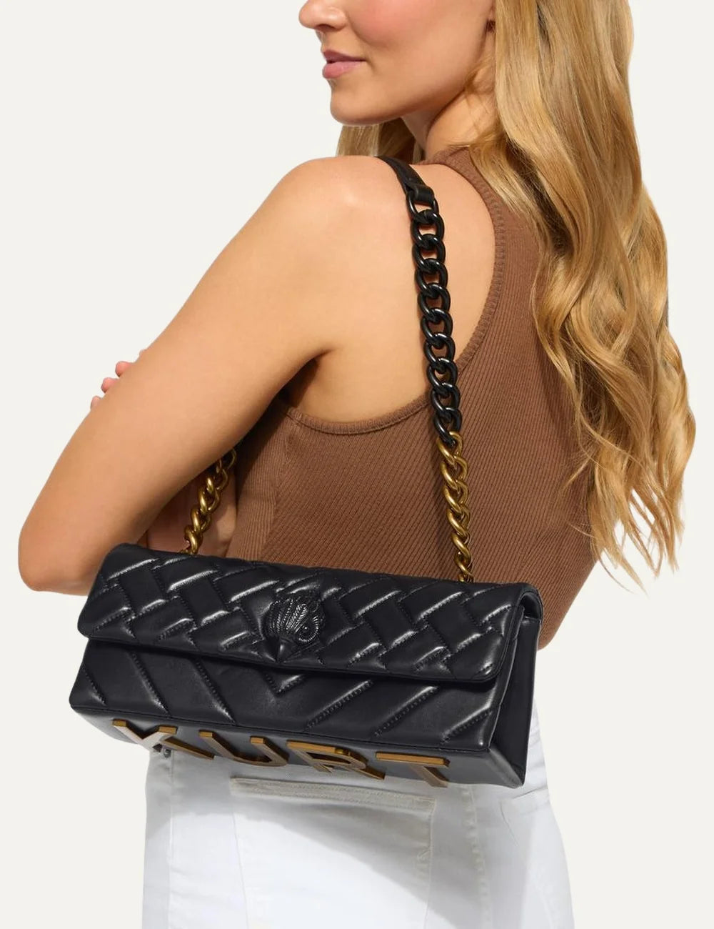 Kurt Geiger women's black leather Kensington East West bag with quilted design, black eagle head and two-tone chain strap model
