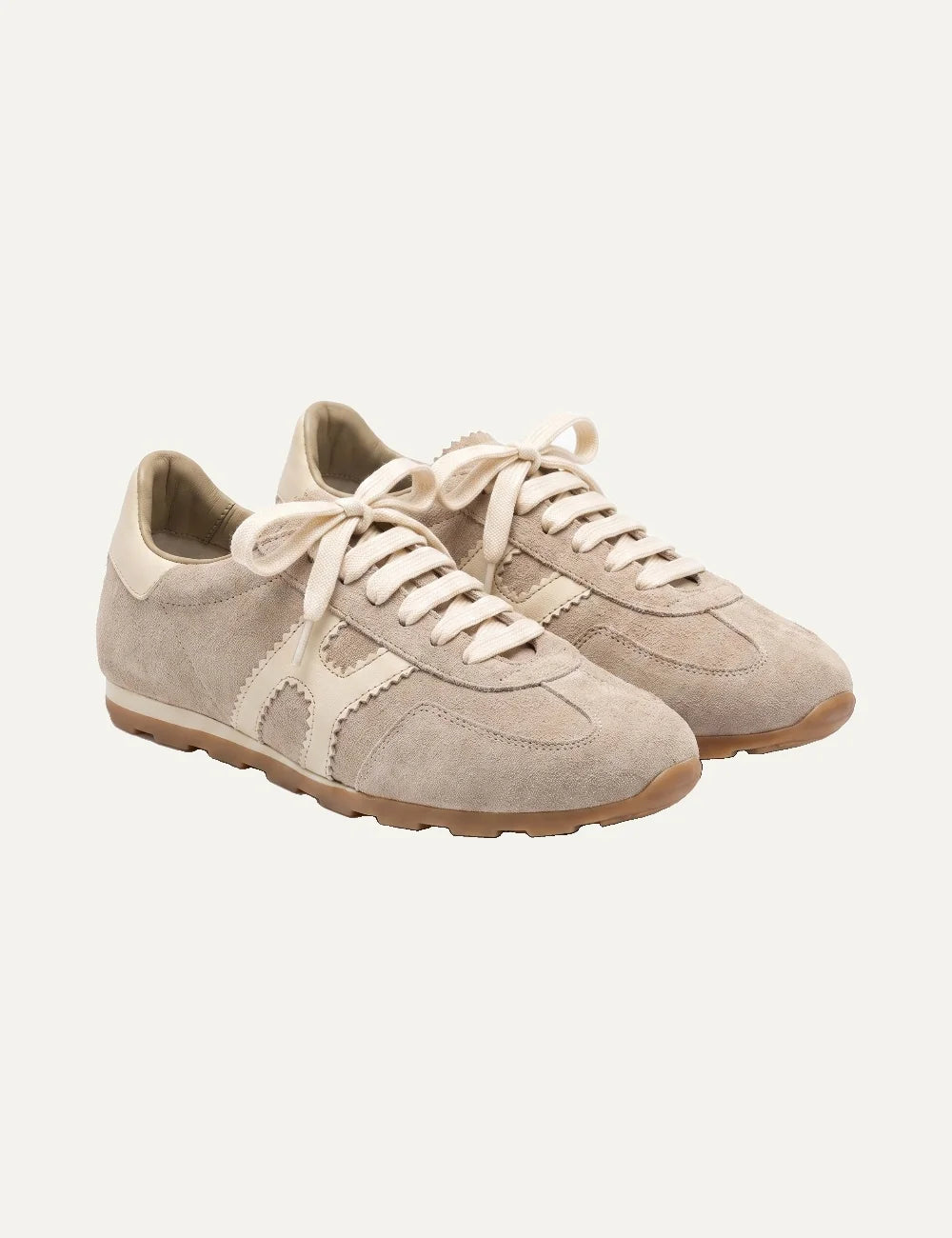 Komis &amp; Komis women's Ardesia beige suede sneakers with cream leather side stripes, lace-up closure and brown rubber sole angled