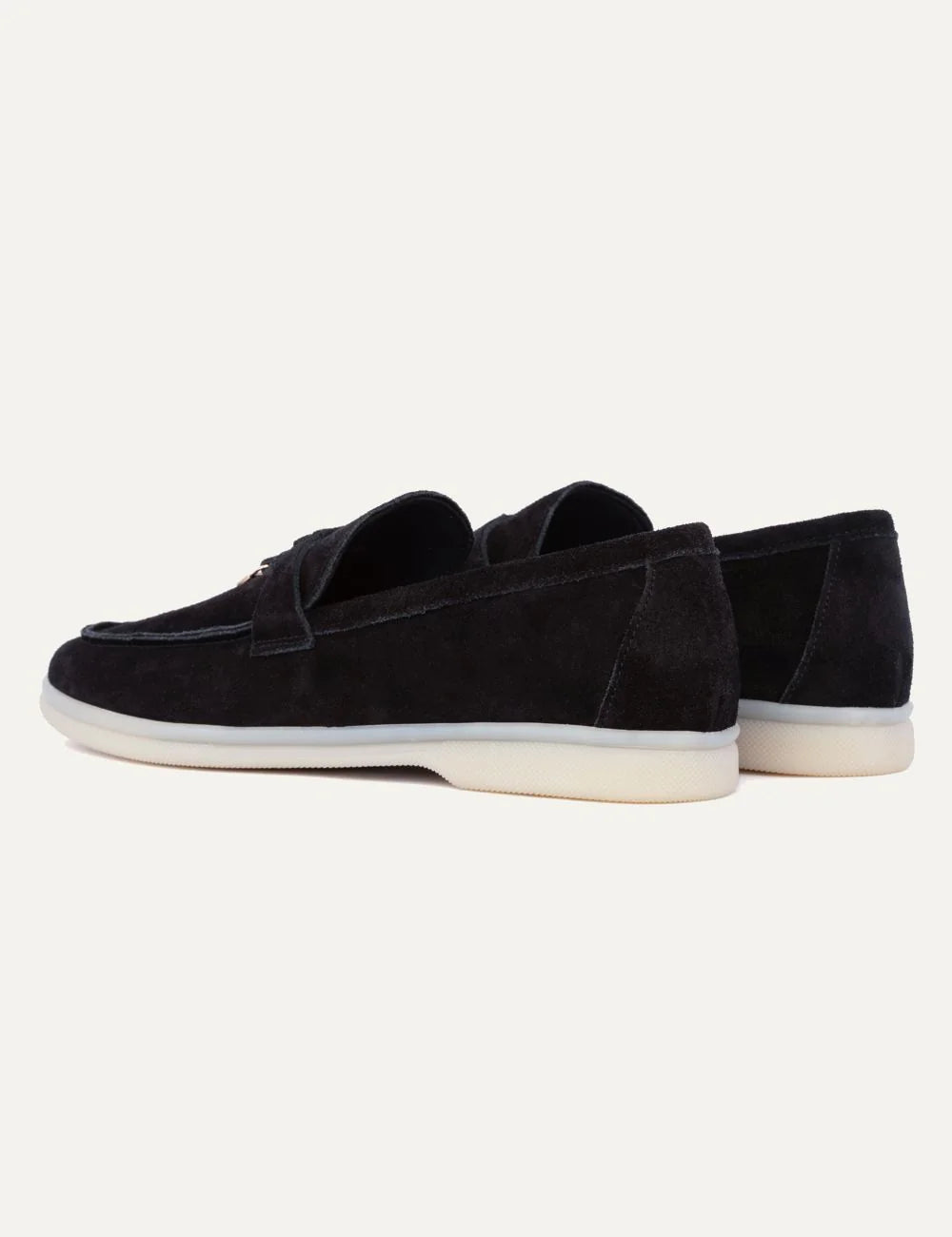 Komis &amp; Komis men's black suede loafers with gold-tone metal detail and contrasting cream rubber sole,  back view