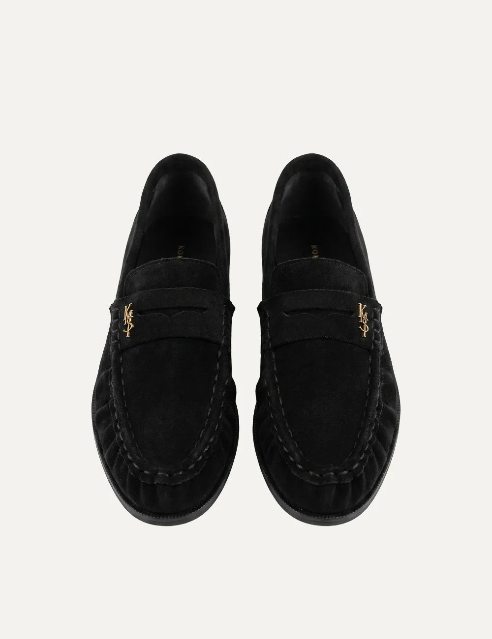 Komis &amp; Komis women's black suede loafers with gold logo. front view
