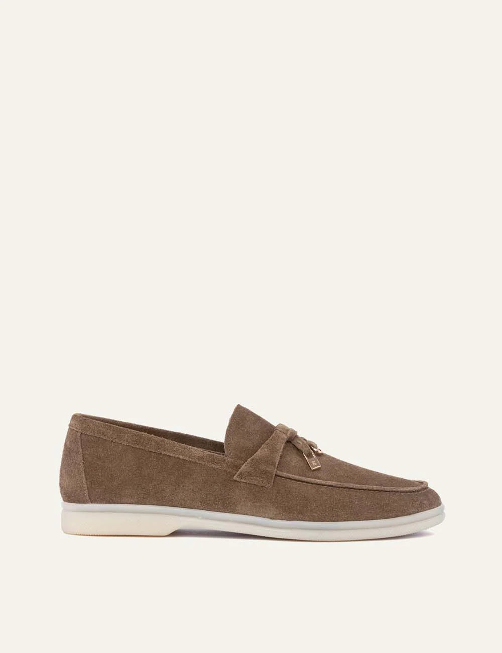 Komis &amp; Komis men's taupe suede loafers with gold-tone metal detail and contrasting cream rubber sole, side view