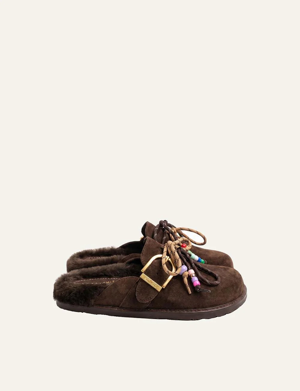 Komis &amp; Komis women's brown suede fur-lined mules with gold buckle.