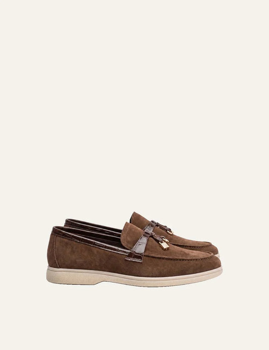 Komis &amp; Komis women's brown suede loafers with gold padlock detail.