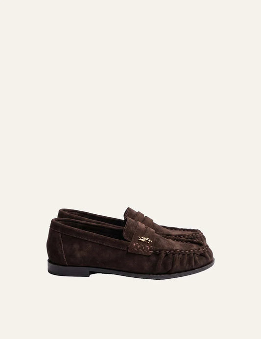 Komis &amp; Komis women's dark brown suede loafers with gold logo.