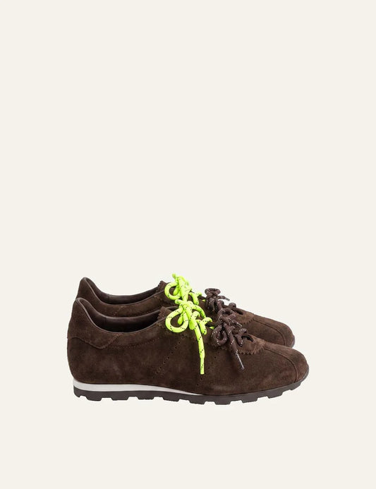 Komis &amp; Komis women's dark brown suede sneakers with neon green laces.