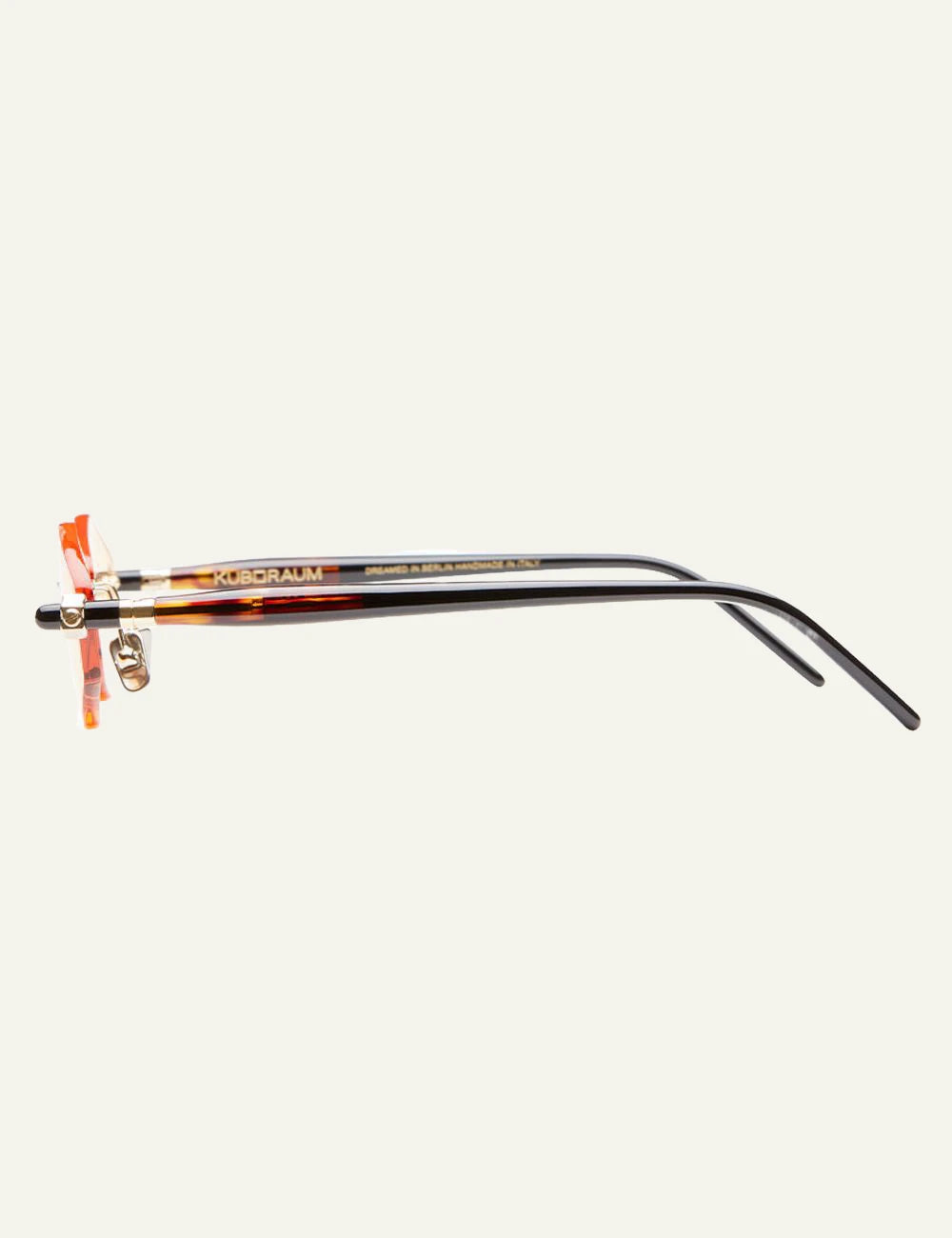 Kuboraum P60 sunglasses light gold rimless me orange lenses side view