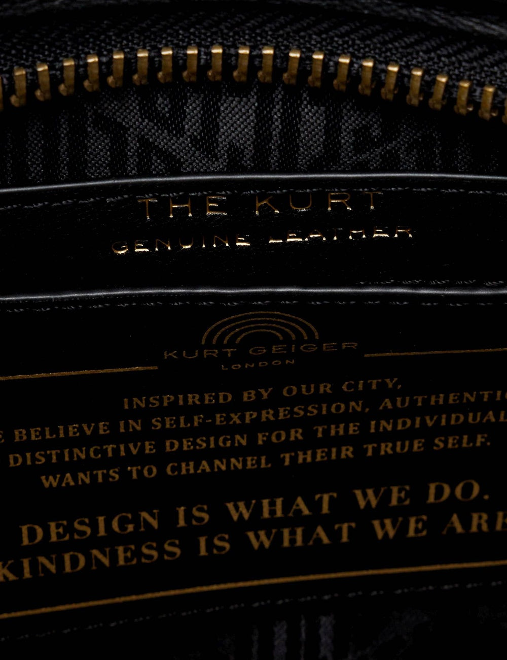 kurt geiger black leather shoulder bag eagle head detail top view