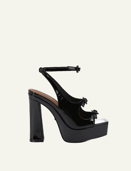 Kurt Geiger black patent platform sandals with bow details and block heel