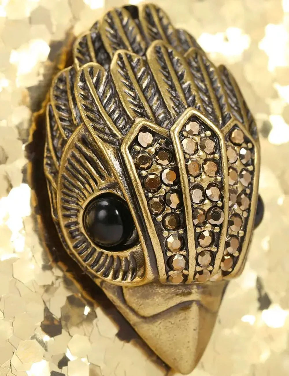 Gold glitter Kurt Geiger clutch bag with eagle head clasp detail