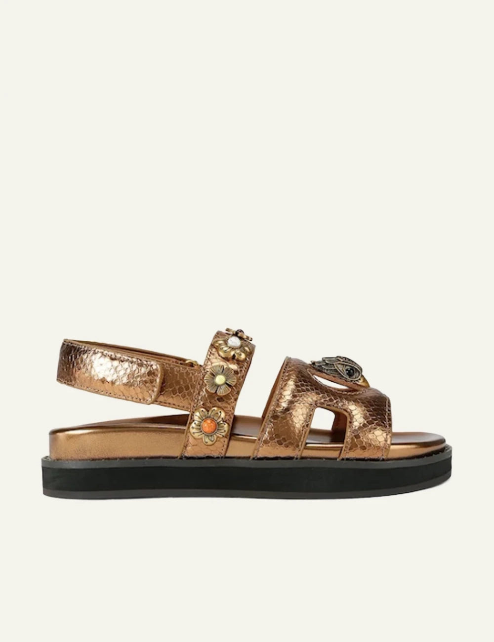 Kurt Geiger gold leather sandal snake texture floral studs eagle logo side view.