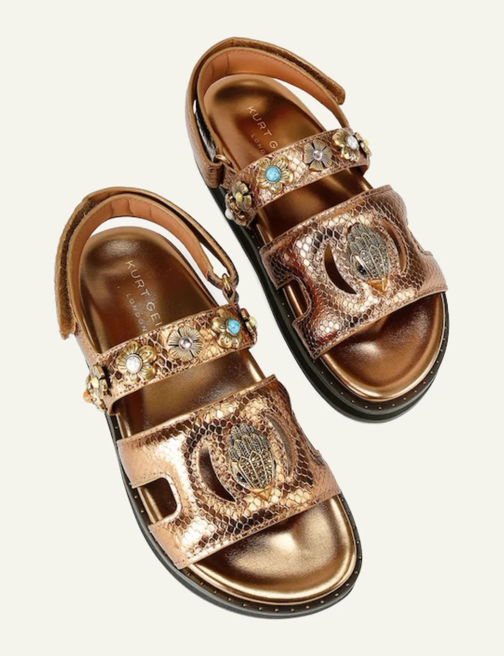 Kurt Geiger gold leather sandal snake texture floral studs eagle logo top view.
