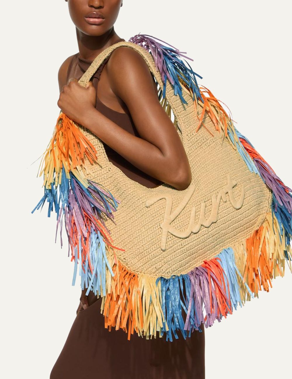 Kurt Geiger raffia hobo bag beige multicolor fringe front model view