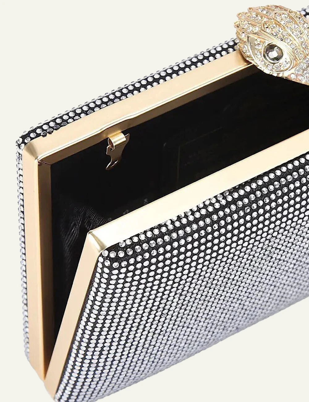 Kurt Geiger London Crystal Kensington clutch open interior view with metal frame