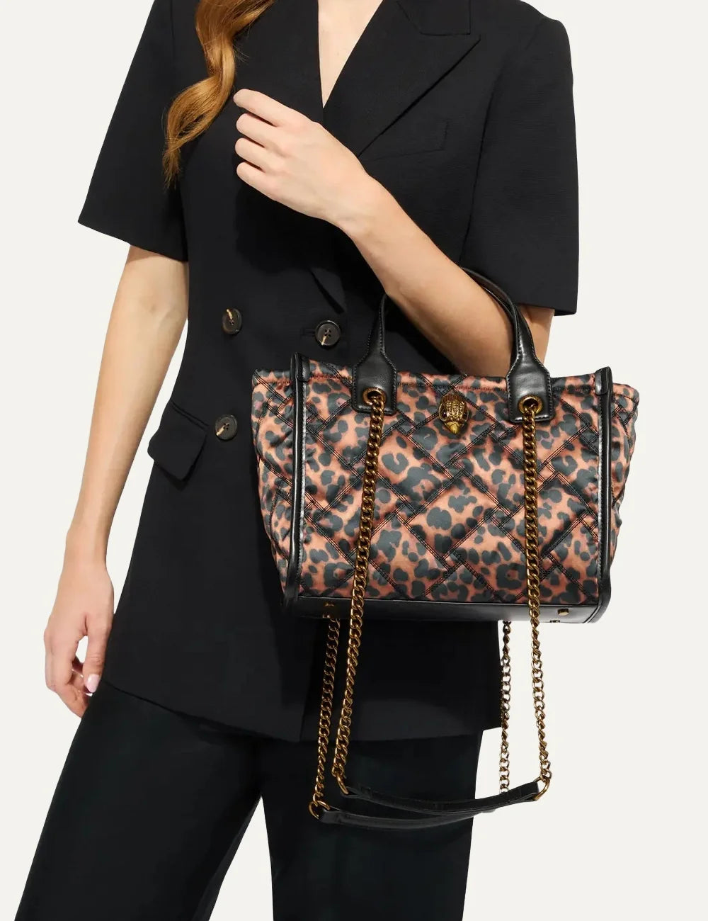 Kurt Geiger London women animal print quilted nylon shopper bag with eagle head and chain straps model