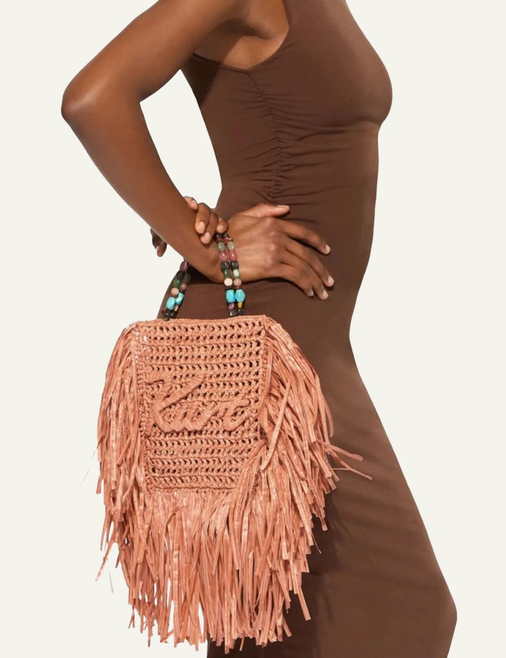 kurt geiger raffia fringe mini tote bag orange beaded handle front model view